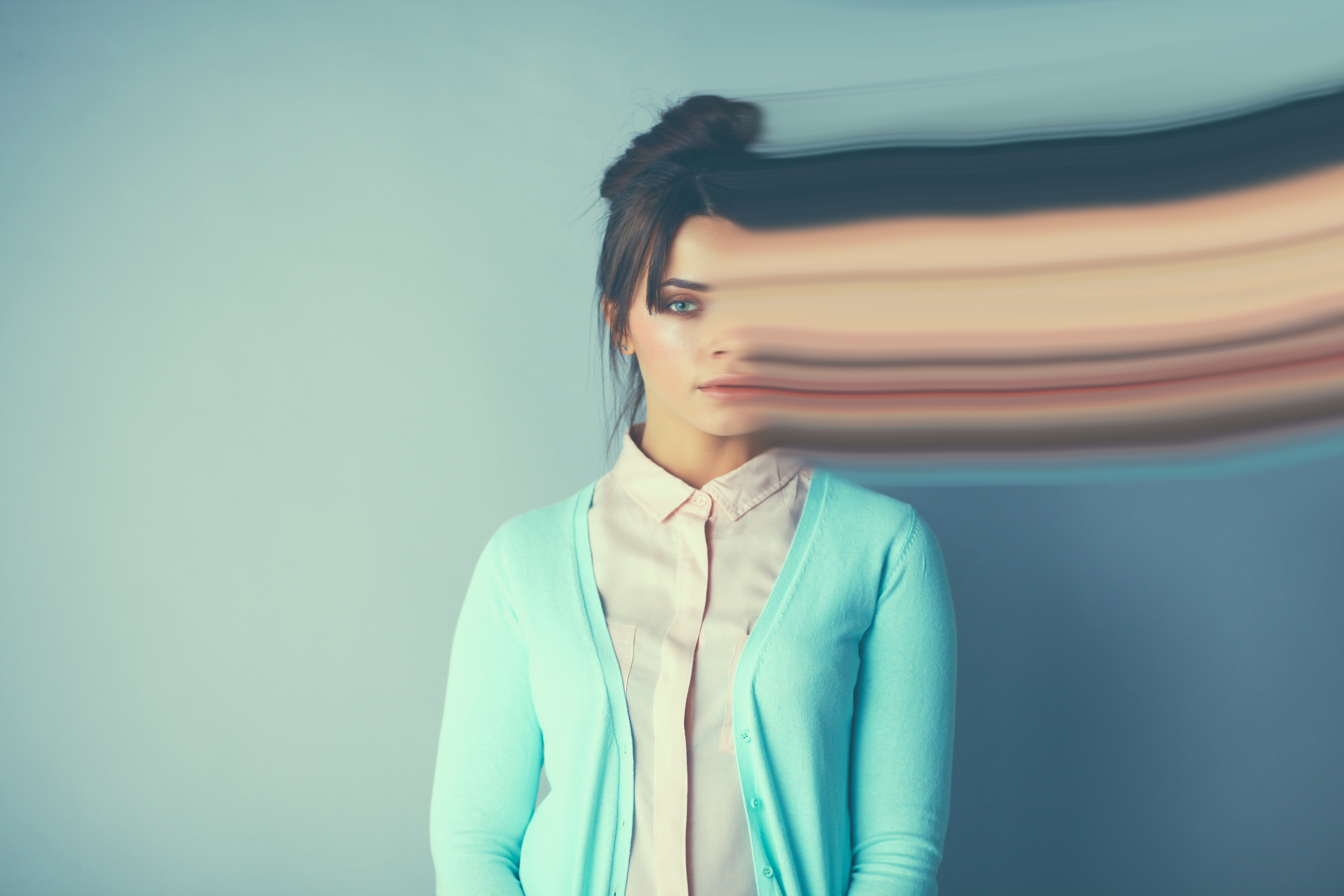 Portrait of an attractive fashionable young brunette woman